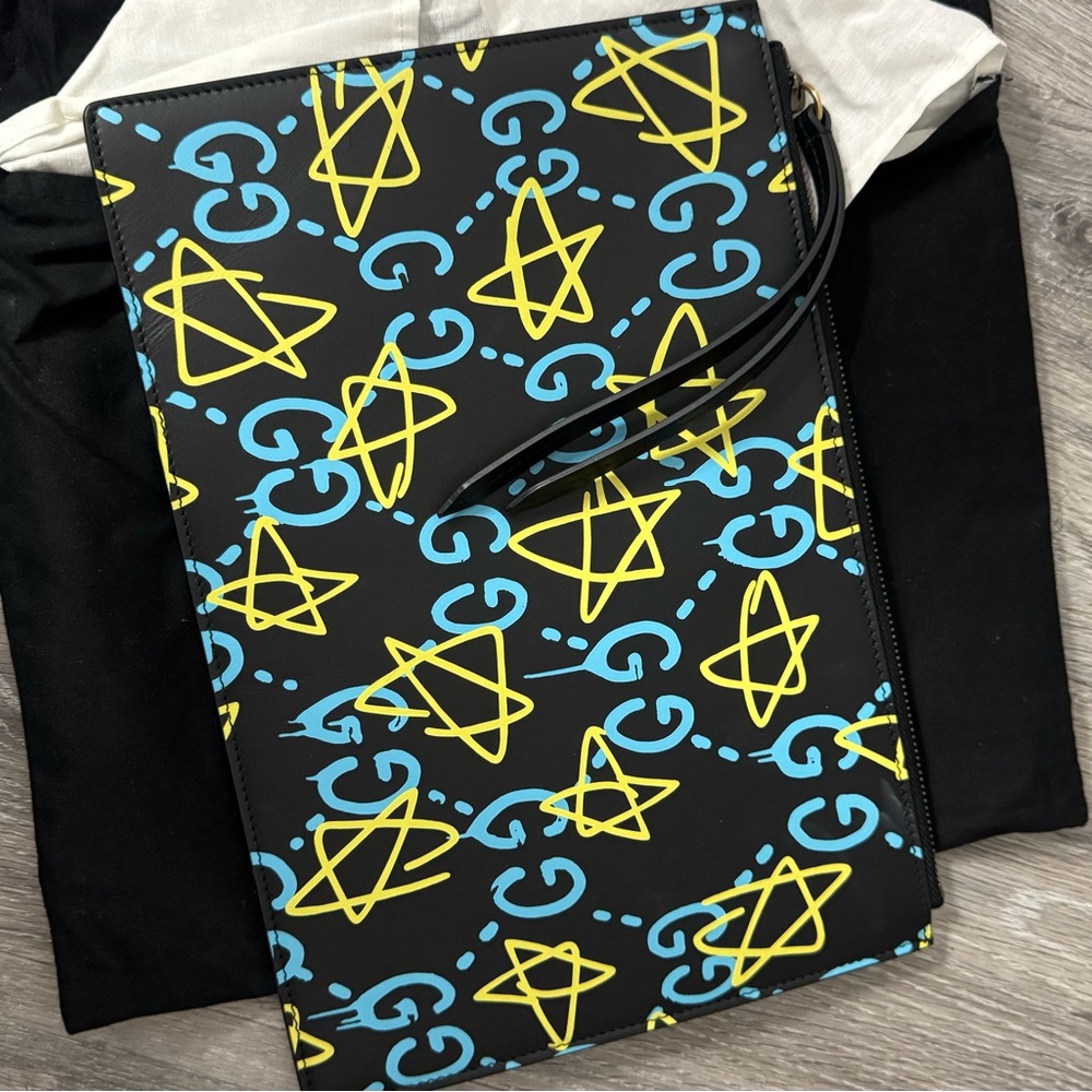 SOLD ! Gucci Black Clutch with Yellow and Blue Star Pattern